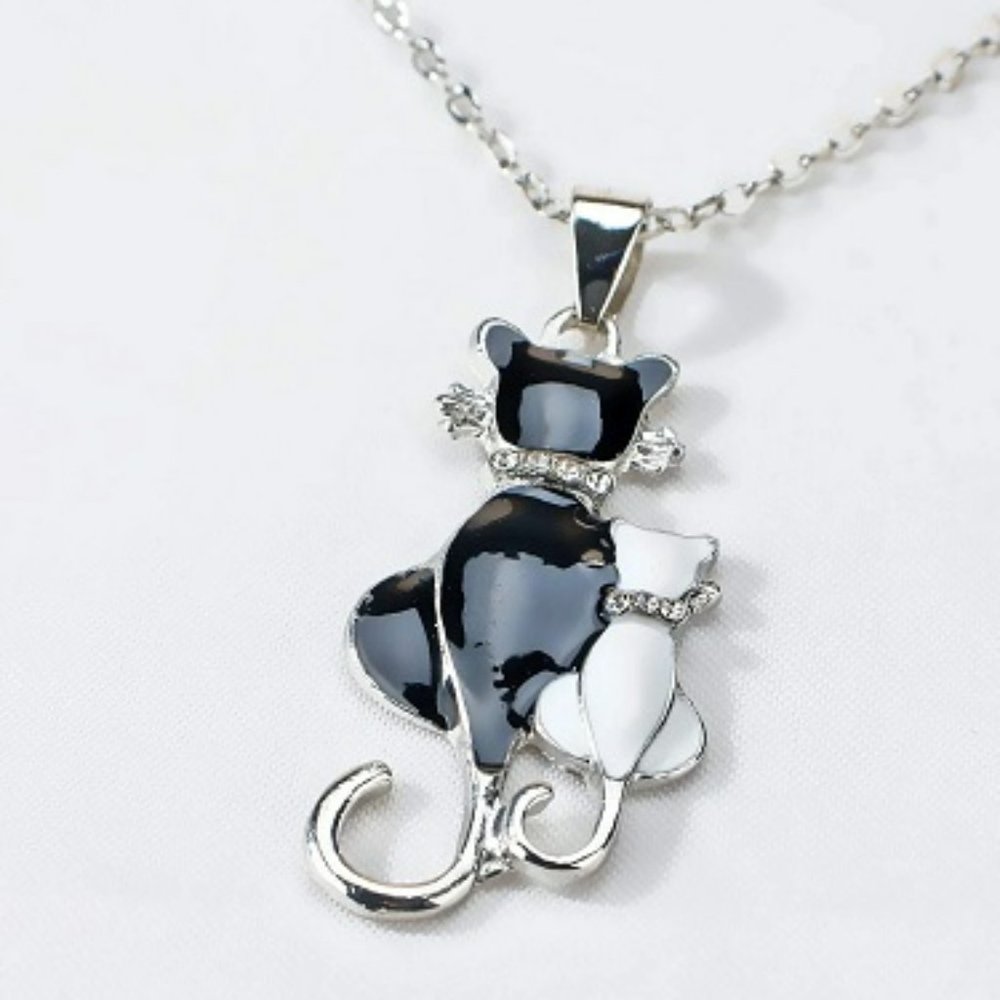 Silver Colored Necklace With Pair of Cats